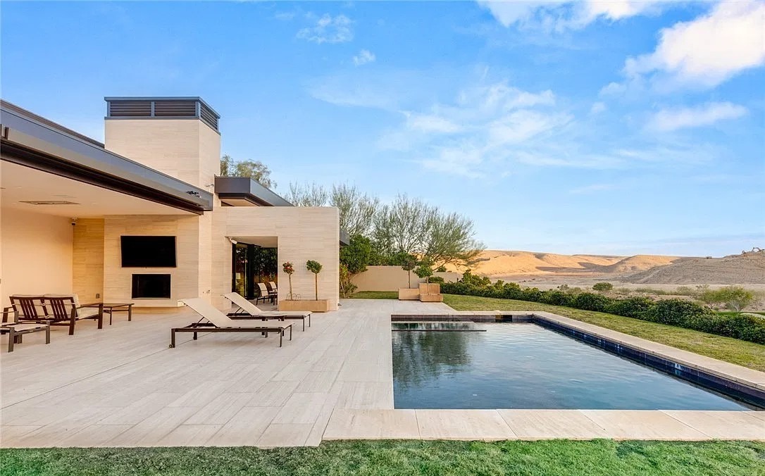 Pool and patio at a modern home in The Summit Club, Summerlin.